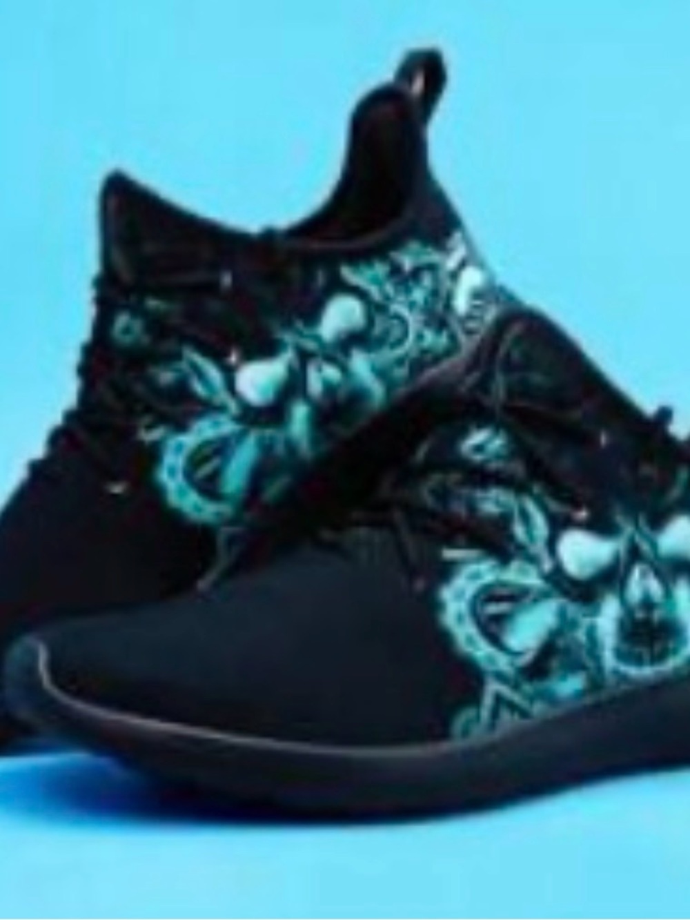 Unisex Black Lightweight Sneakers with Teal Skull Accent